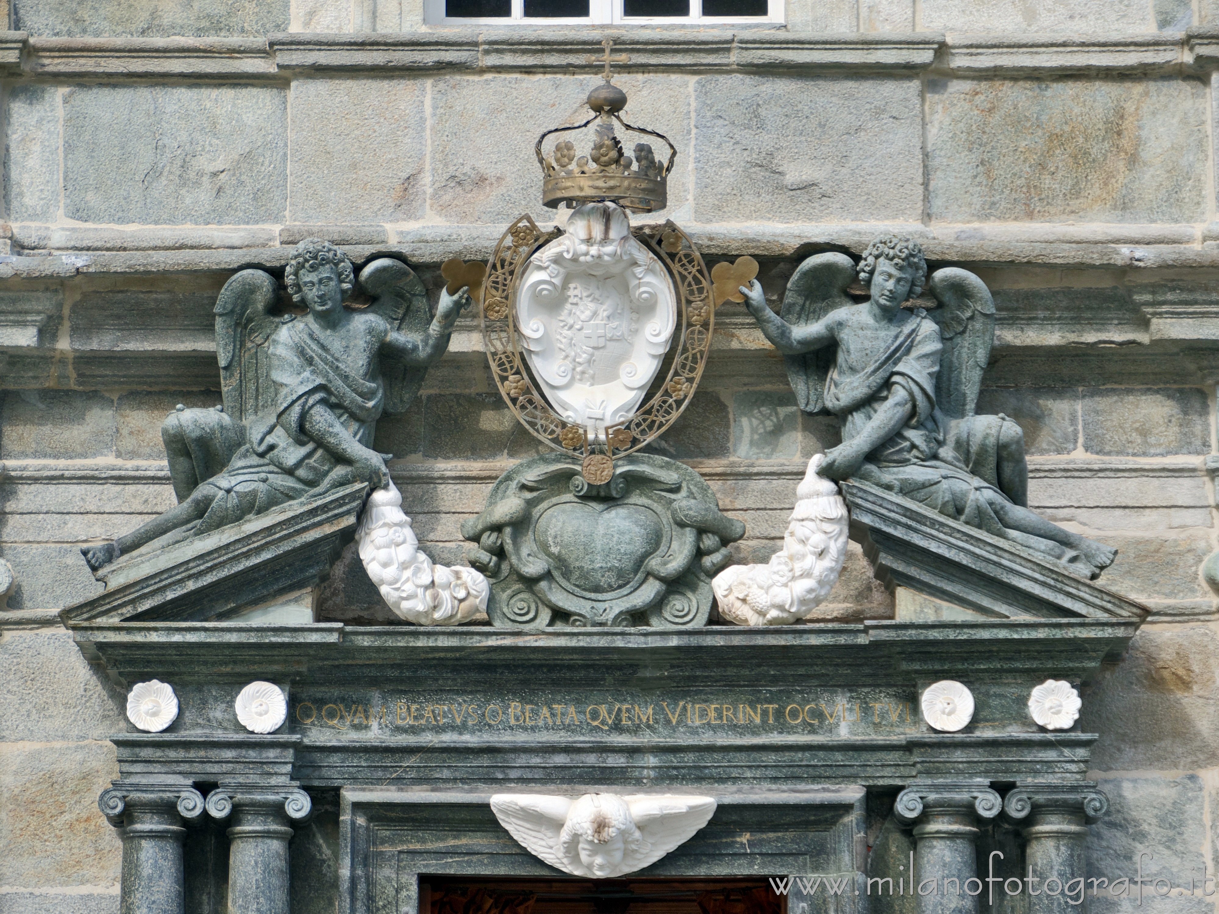 Biella (Italy): Fronton of the door  of the Ancient Basilica of the Santuary of Oropa - Biella (Italy)