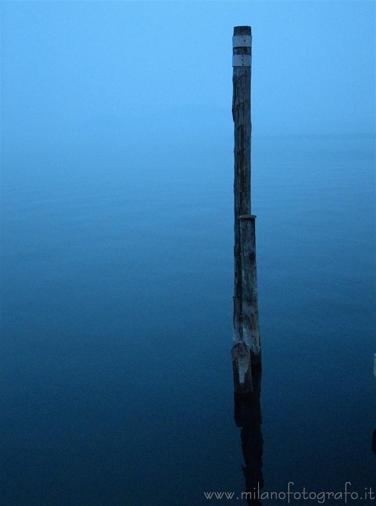 Belgirate (Novara, Italy) - Pole in Maggiore Lake in the fog