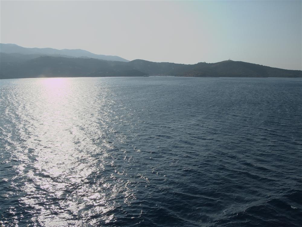 Korfu (Greece) - Sun reflecting on the sea in the late afternoon