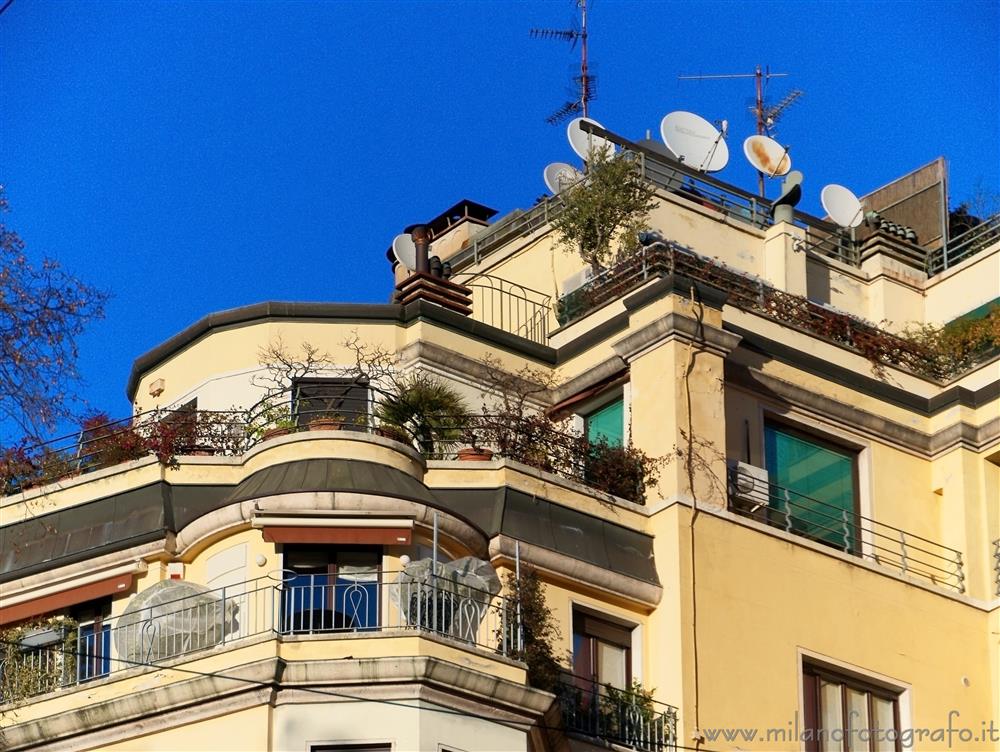 Milan (Italy) - Cascade of terrasses in a building of the center