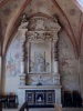 San Giuliano Milanese (Milan, Italy): Madonna and Child on humble throne, between saints and horses in the Abbey of Viboldone