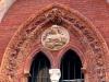 Milan (Italy): Detail of a mirror in the facade of the once Ca'Granda hospital