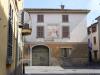 Caravaggio (Bergamo, Italy): An old house of the town with a fresco of the Deposition on the facade