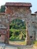 Cossato (Biella, Italy): The vineyards of Castellengo seen through the Gate of the Moor of the Castle of Castellengo