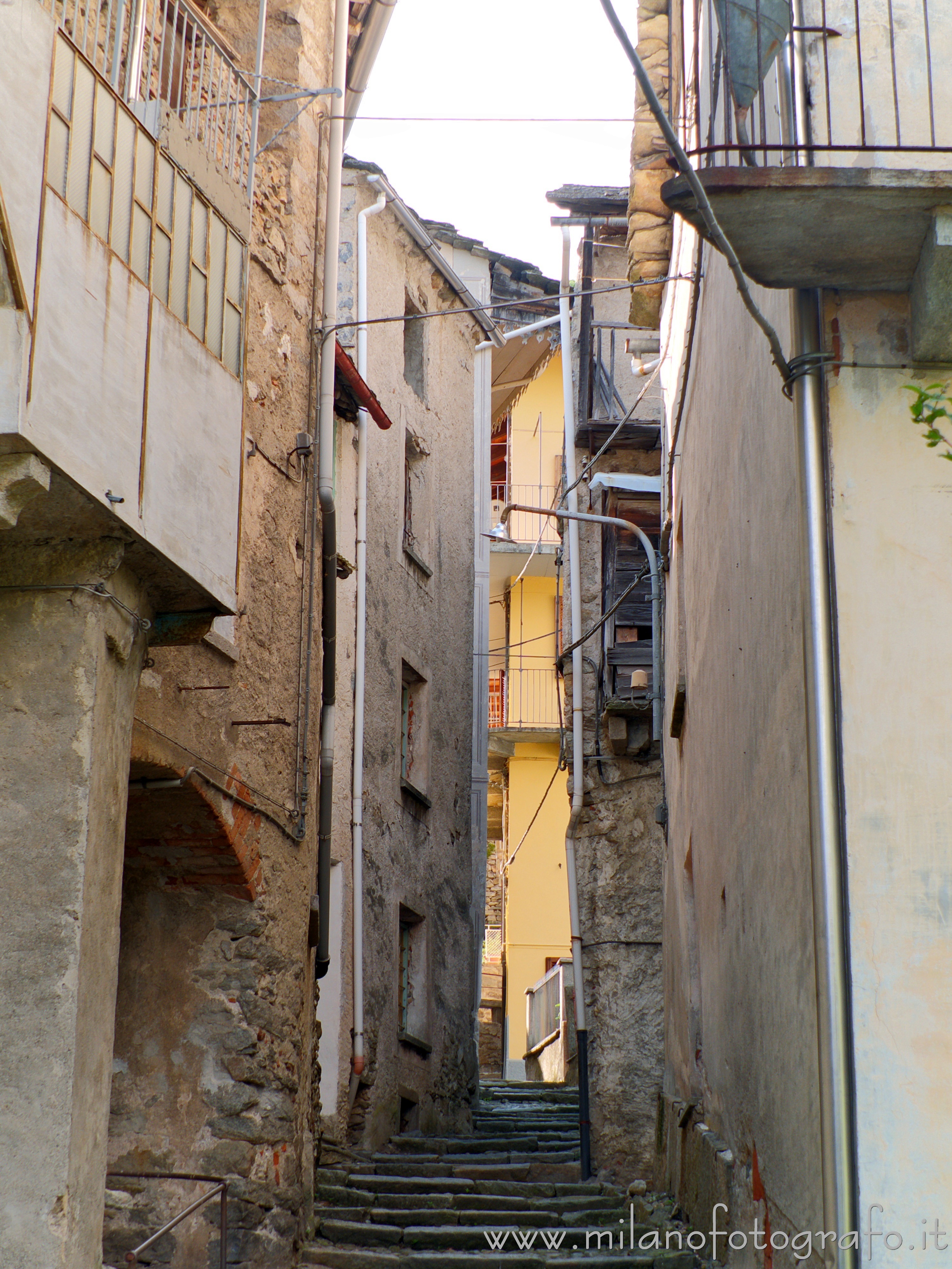Montesinaro fraction of Piedicavallo (Biella, Italy): Narrow street in the village - Montesinaro fraction of Piedicavallo (Biella, Italy) Montesinaro fraction of Piedicavallo (Biella, Italy): Narrow street in the village - Montesinaro fraction of Piedicavallo (Biella, Italy)