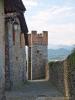 Candelo (Biella, Italy): Square tower of the ricetto with the Biella Prealps in the background